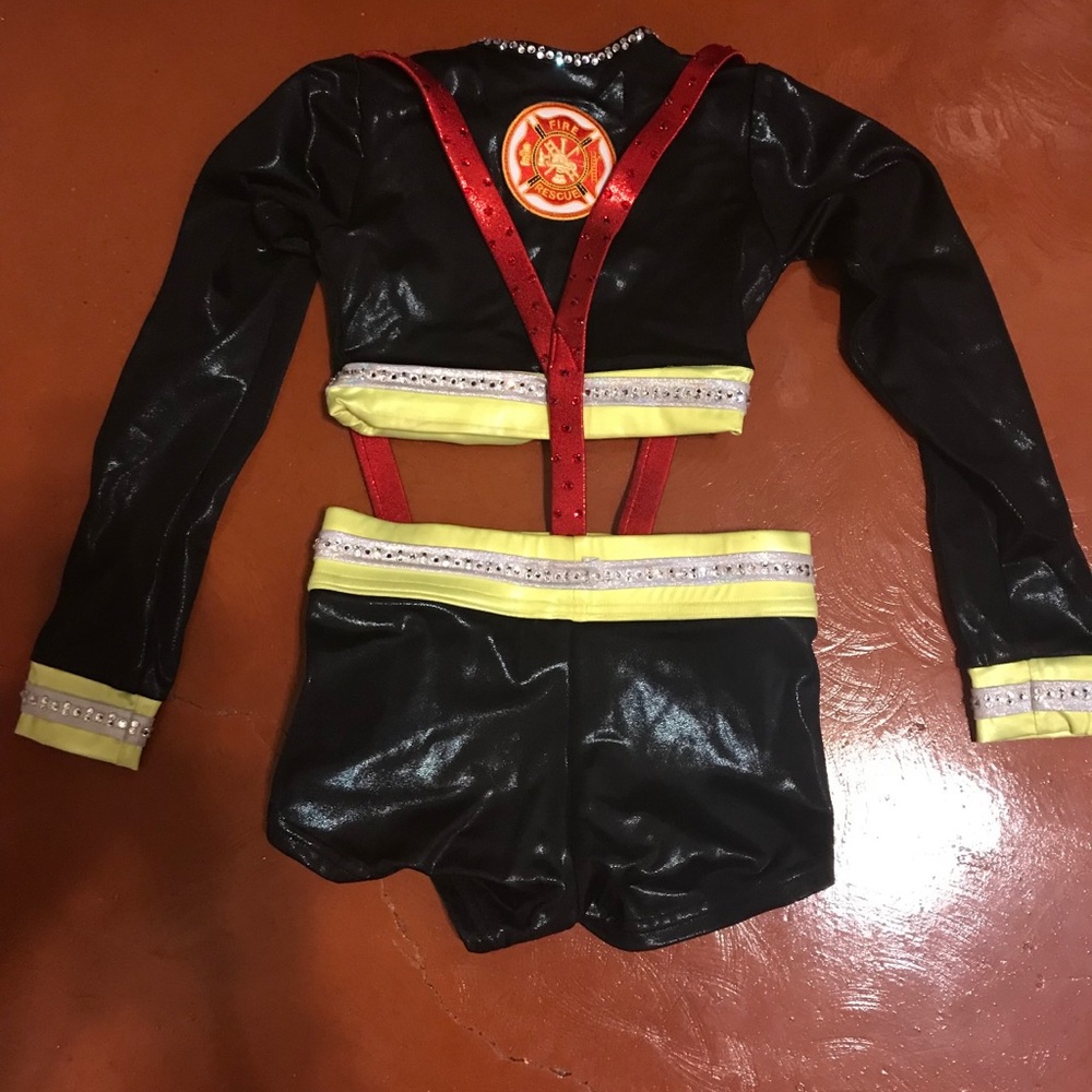 Custom Details Dancewear fireman’s dance costume. Size CS top and CM bottoms.